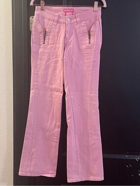Pink Y2K low rise jeans with zipper pocket detail